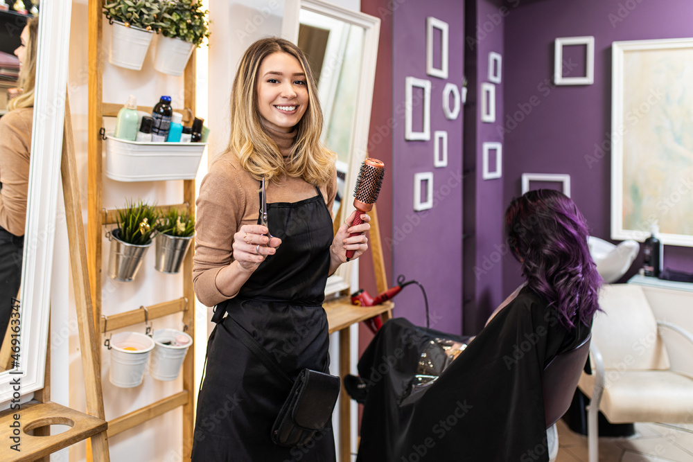 Beautiful hairstyle of young adult woman with purple hair in hair salon. Beautiful hairstyle of young adult woman with purple hair in hair salon.