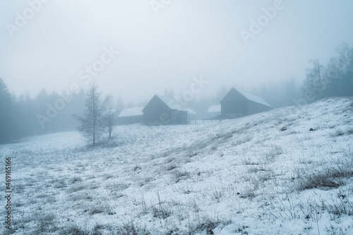 old farm in fog in early winter © Øyvind
