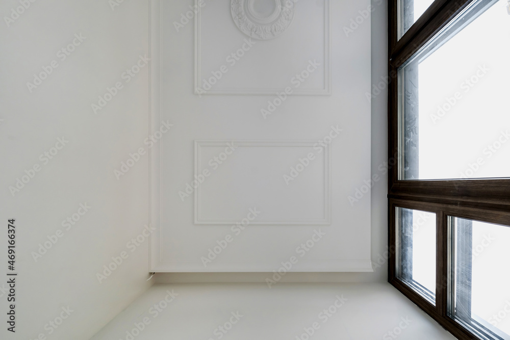 Detail of corner ceiling cornice with intricate crown molding. Detail of corner ceiling cornice with intricate crown molding.
