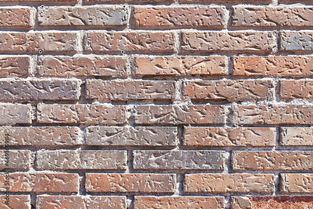 Brick wall texture with cracked tiles and cement. Classic brickwall surface background Brick wall texture with cracked tiles and cement. Classic brickwall surface background