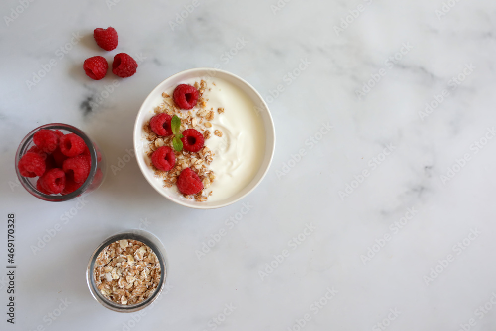 oatmeal with berries. Yoghurt with granola. oatmeal with berries. Yoghurt with granola.