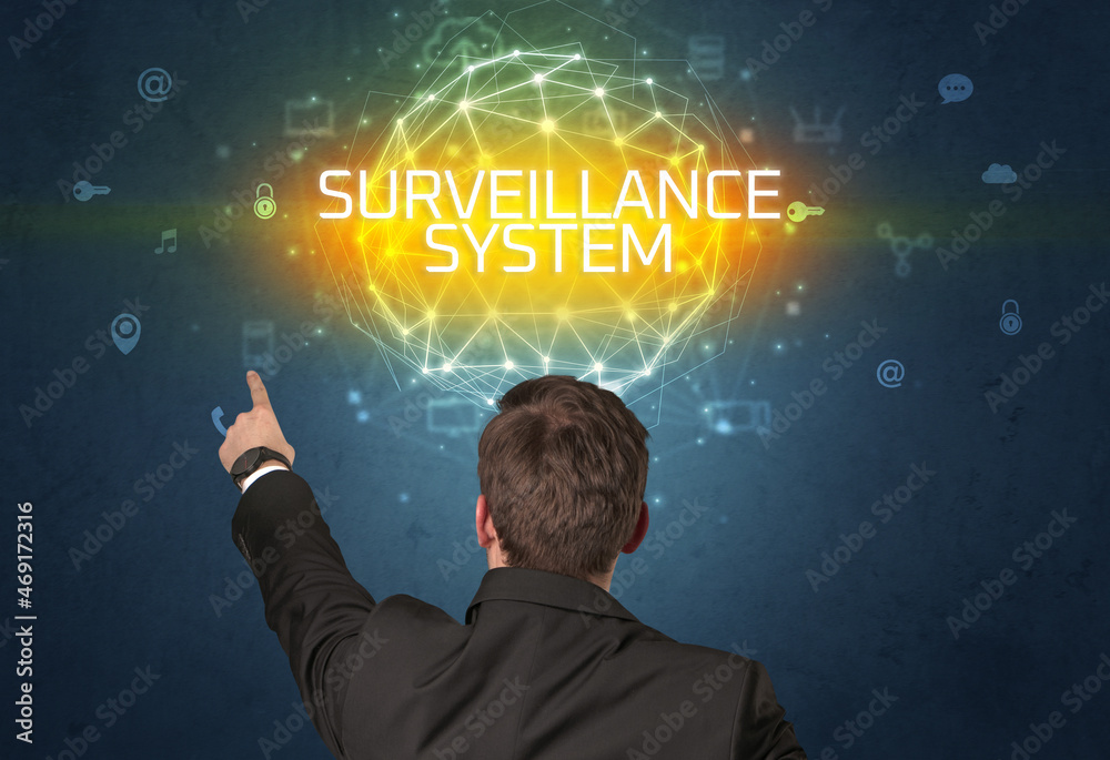Rear view of a businessman, online security concept Rear view of a businessman, online security concept