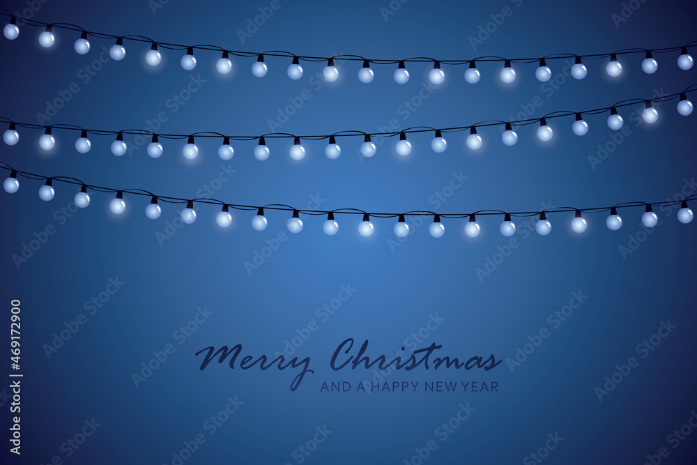 blue christmas greeting card with shiny fairy lights