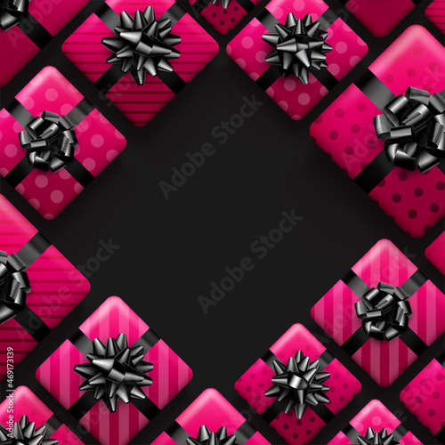 Pink striped and polka dot gift boxes with black bow.