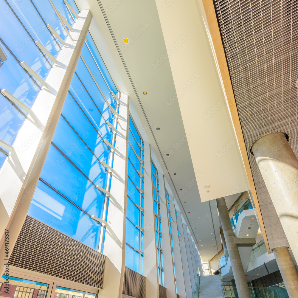 Fototapeta premium Abstract fragment of architecture of modern lobby, hallway of the luxury hotel, shopping mall, business center in Vancouver, Canada. Interior design.