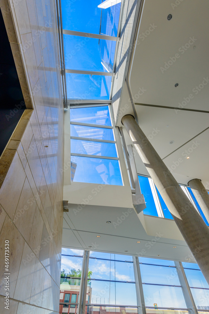 Obraz premium Abstract fragment of the architecture of modern lobby, hallway of the luxury hotel, shopping mall, business center in Vancouver, Canada. Interior design.