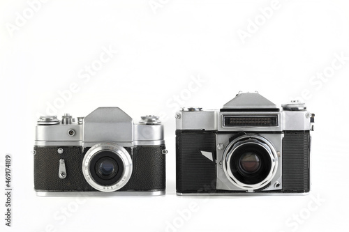 MOSCOW, RUSSIA, NOVEMBER 14, 2021. Very rare old Soviet 35 mm SLR camera Zenit-4 and Zenit 3, released 1967 and 1961 on white background.