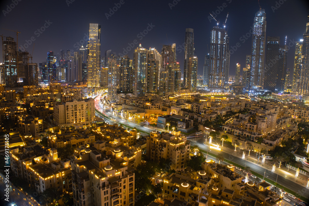 Naklejka premium Night cityscape inlcude mix of Low and High rise buildings in Dubai downtown