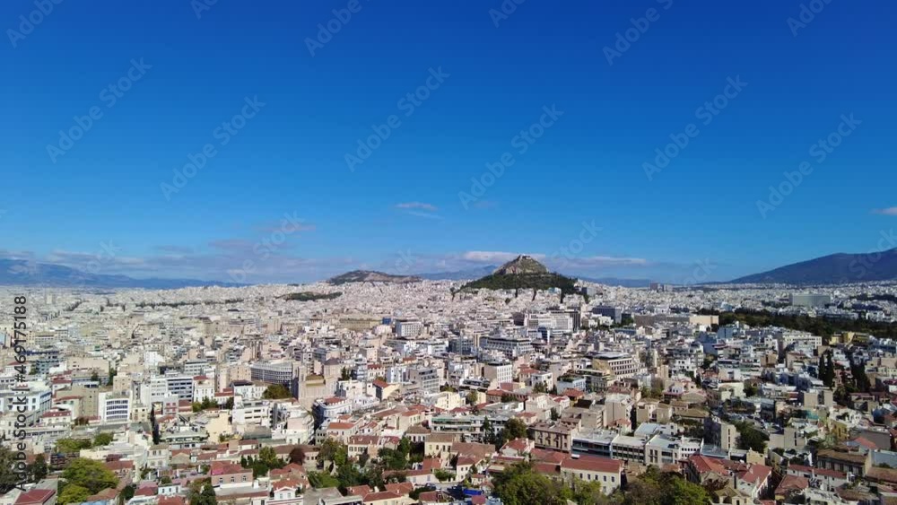 Lycabettus Hill in Athens. Cityview to the capital city of Greece, Europe during a blue sky summer day. Lycabettus Hill in Athens. Cityview to the capital city of Greece, Europe during a blue sky summer day.