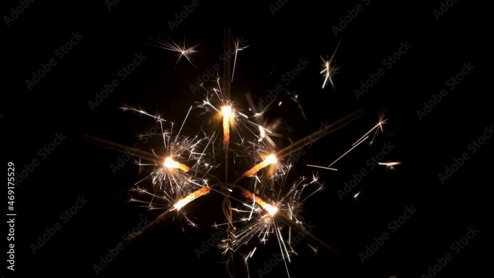 Slow motion. Simultaneous burning of five sparklers. Beginning and end of burning sparklers. Close-up Slow motion. Simultaneous burning of five sparklers. Beginning and end of burning sparklers. Close-up