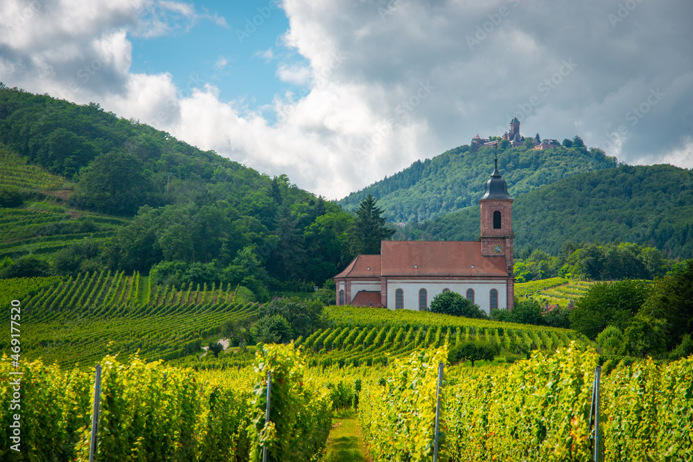 small mountain chapel and vineyards in the Alsace France