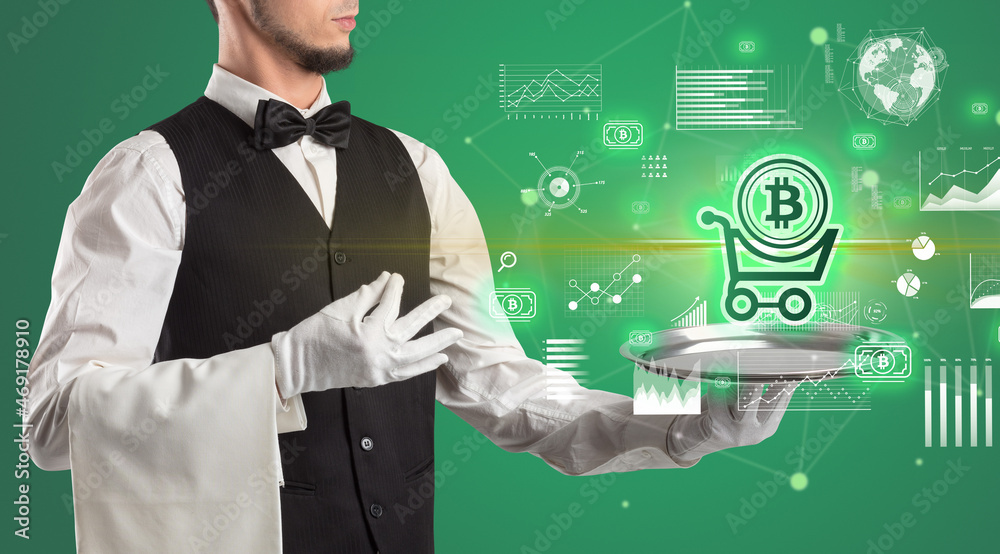 Handsome young waiter in tuxedo holding currency icons on tray Handsome young waiter in tuxedo holding currency icons on tray