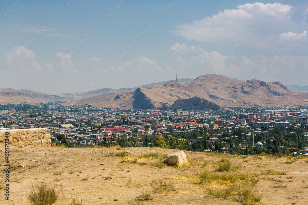 Obraz premium Panoramic view of the Van city, Turkey, Eastern Anatolia. The city is surrounded by mountains. Residential buildings in Van
