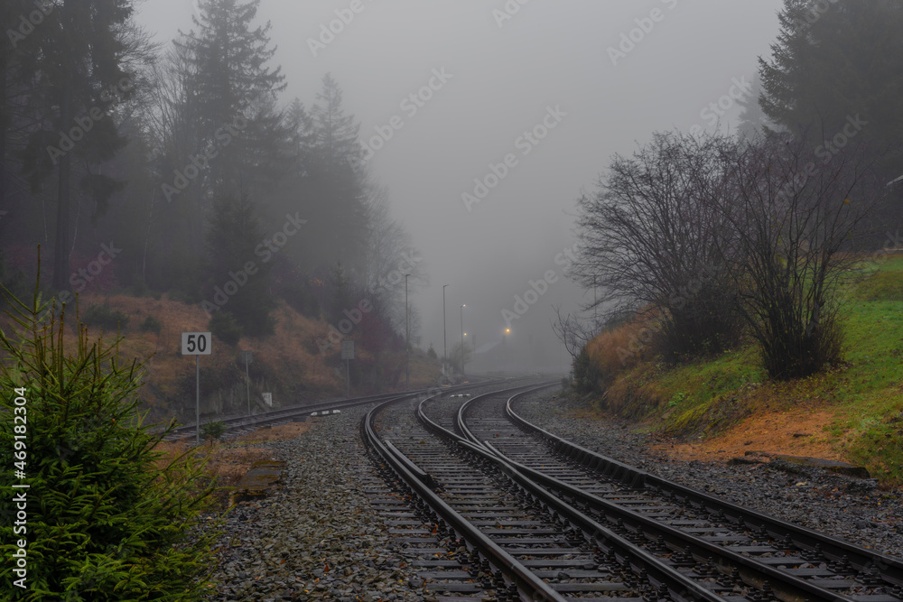 Fototapeta premium Railroad track near Jedlova station in Luzicke mountains in autumn morning