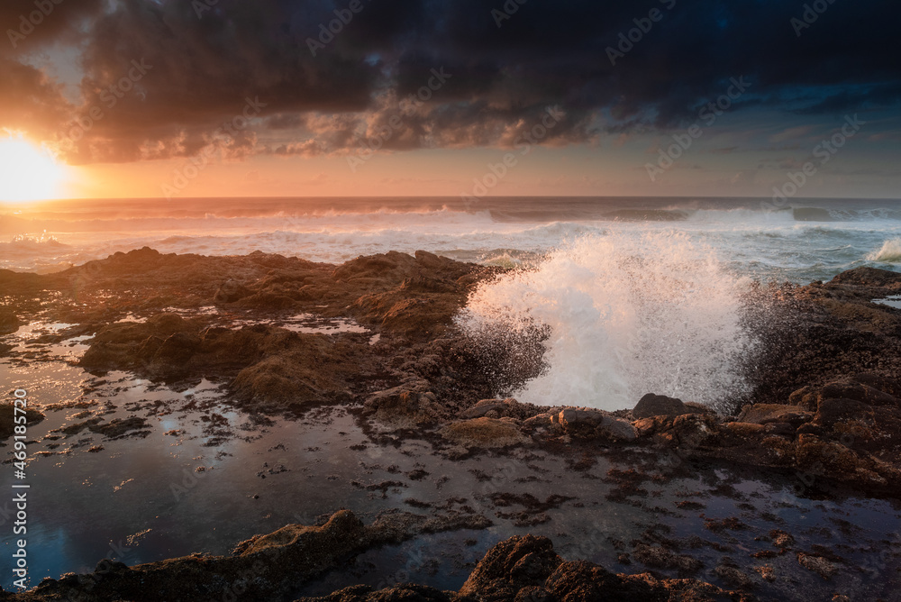 Waves out of Thor's well at sunset