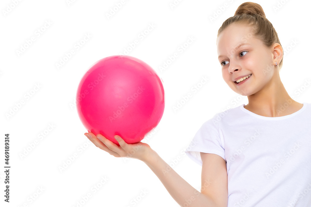 little girl is engaged in fitness with a ball. little girl is engaged in fitness with a ball.