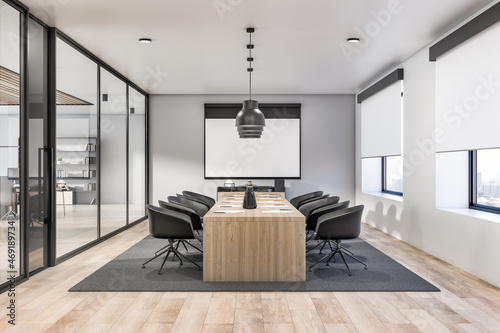 Fototapeta Naklejka Na Ścianę i Meble -  Contemporary concrete and wooden office interior with glass, partition and furniture, daylight, window with city view. Workplace concept. 3D Rendering.