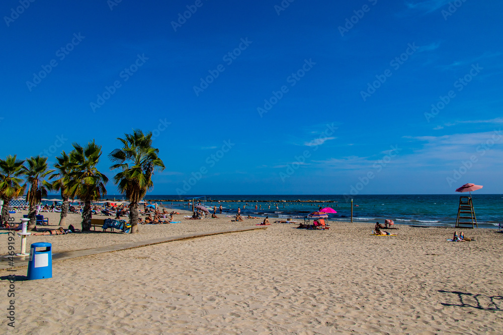 seaside landscape with a beach in the Spanish city of Alicante on a warm sunny day