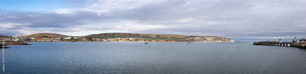 Panorama of Swanage Bay and Pier in Swanage, Dorset, UK on 13 November 2021