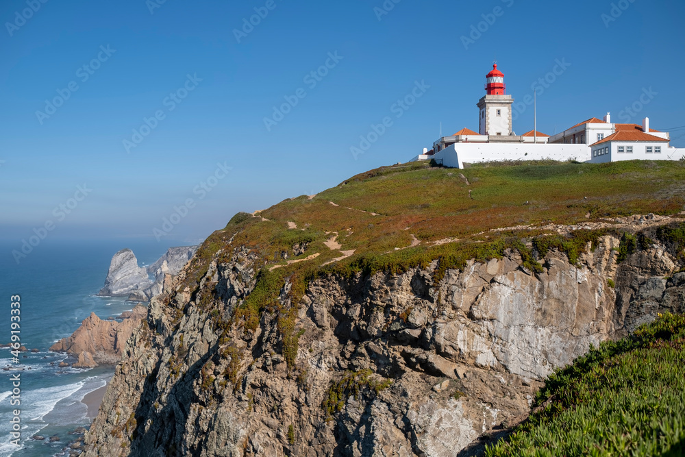 View of the Cabo da Roca Lighthouse. Portuguese Farol de Cabo da Roca is a cape which forms the westernmost point of the Eurasian land mass.