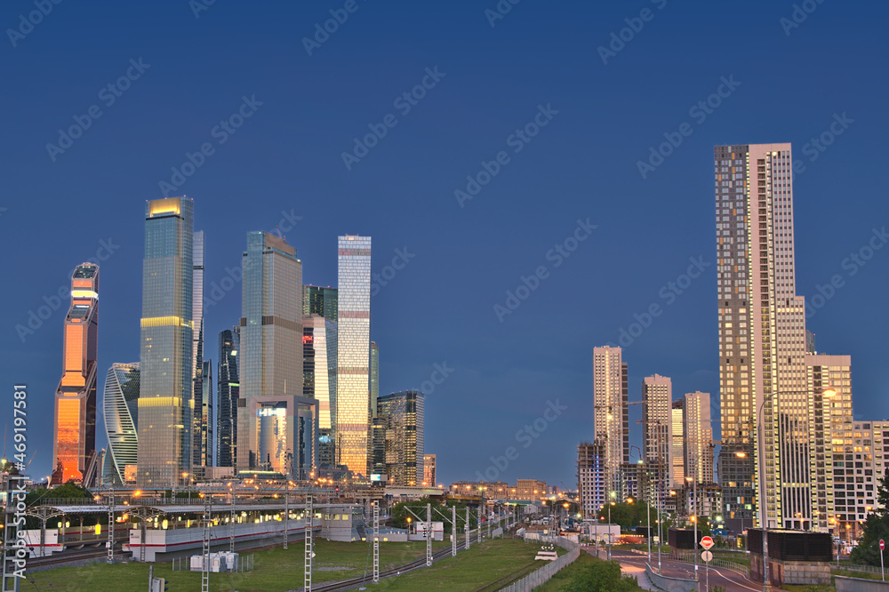 Moscow City skyline after sunset. West site view of evening cityscape.