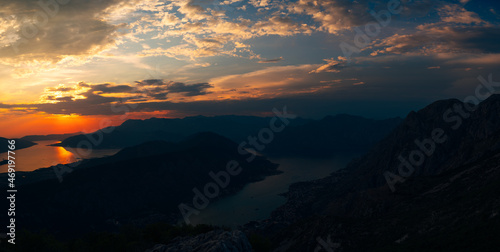 Last rays of the sun over the horizon. Bay of Kotor, Montenegro