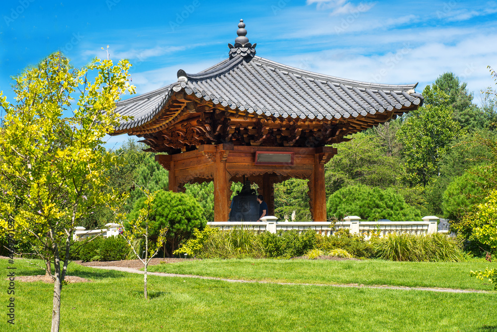 Korean pagoda and the bell of harmony in the summer park