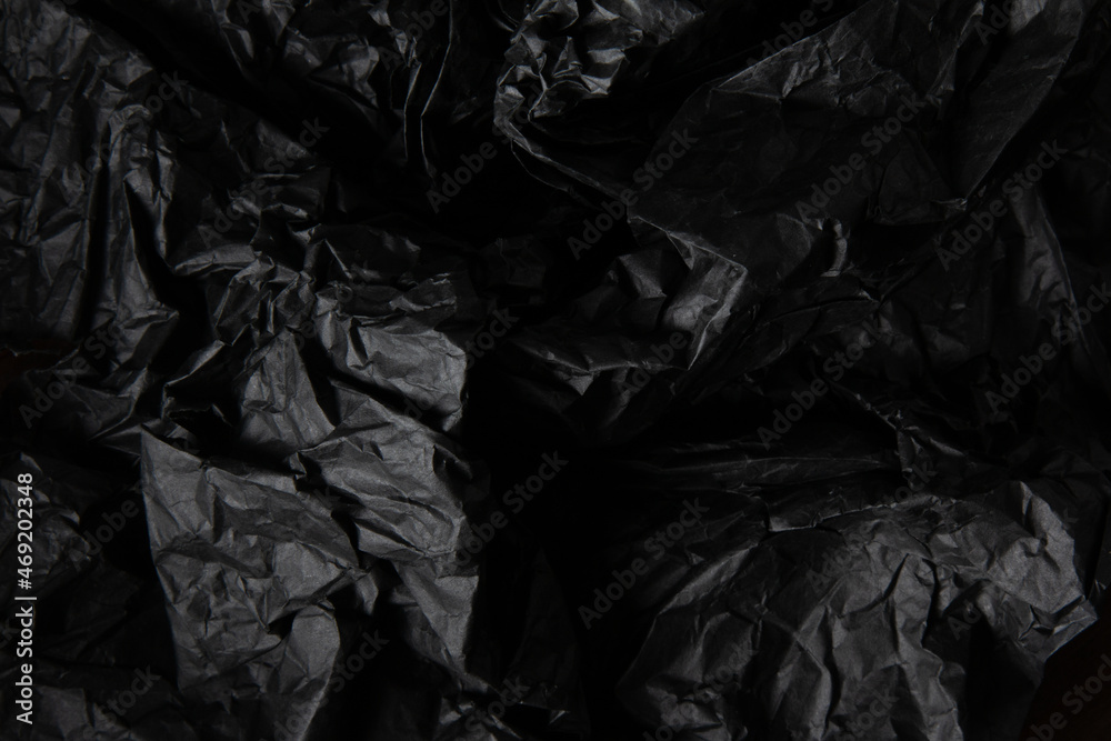 Crumpled black paper texture