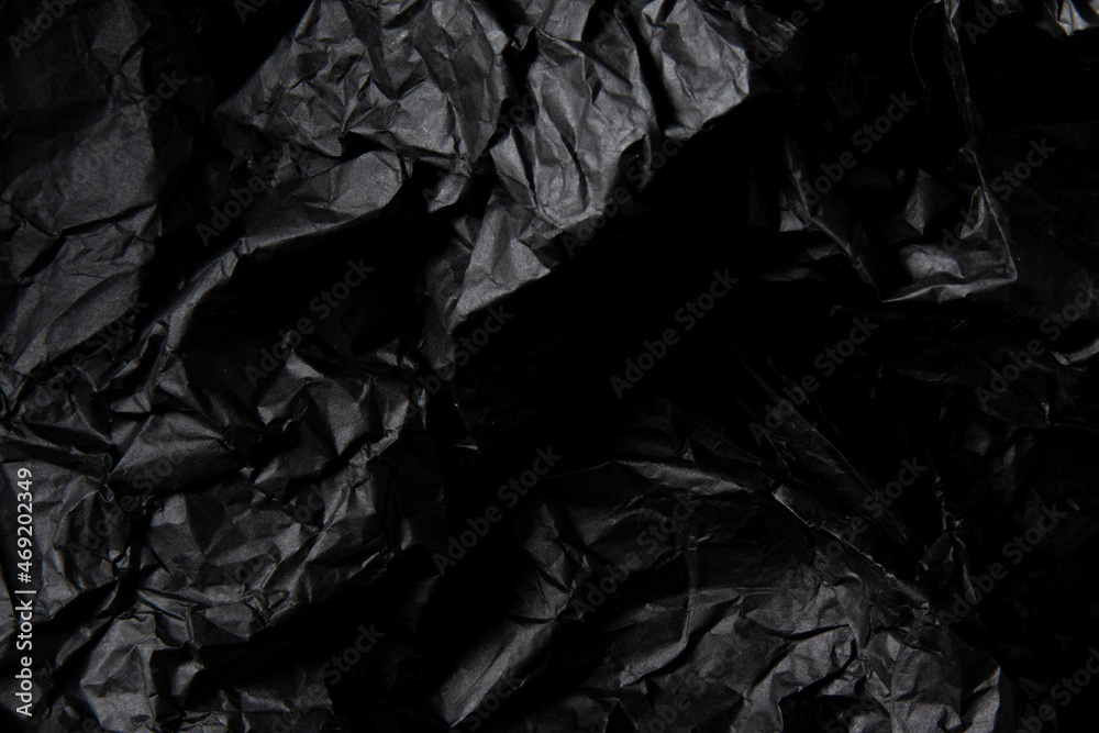 Crumpled black paper texture Crumpled black paper texture