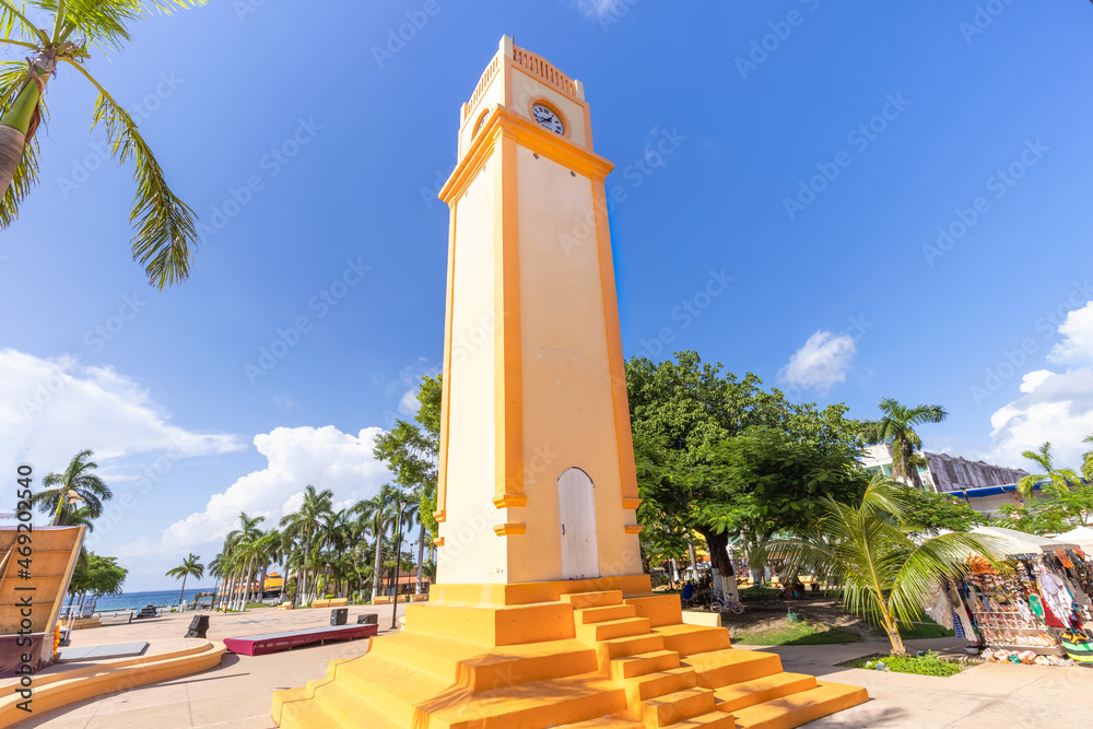 Fototapeta premium San Miguel de Cozumel, Mexico, Central Plaza and colorful colonial city downtown streets during peak months of high tourist season.