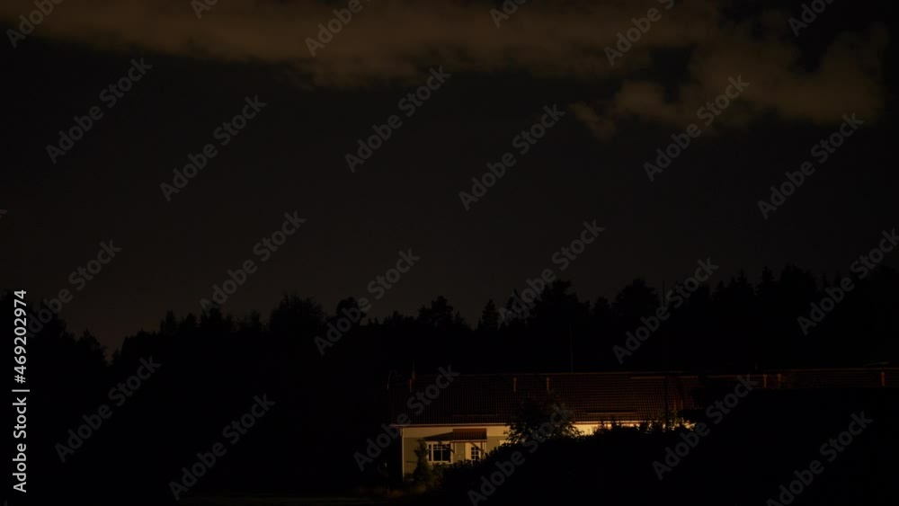 Storm of lightning and thunder above house