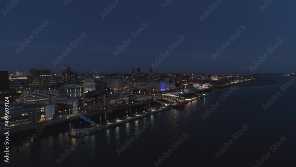River Mersey, River of Light, Liverpool, England. Night time. Drone flys forward and tilts down. 4k River Mersey, River of Light, Liverpool, England. Night time. Drone flys forward and tilts down. 4k