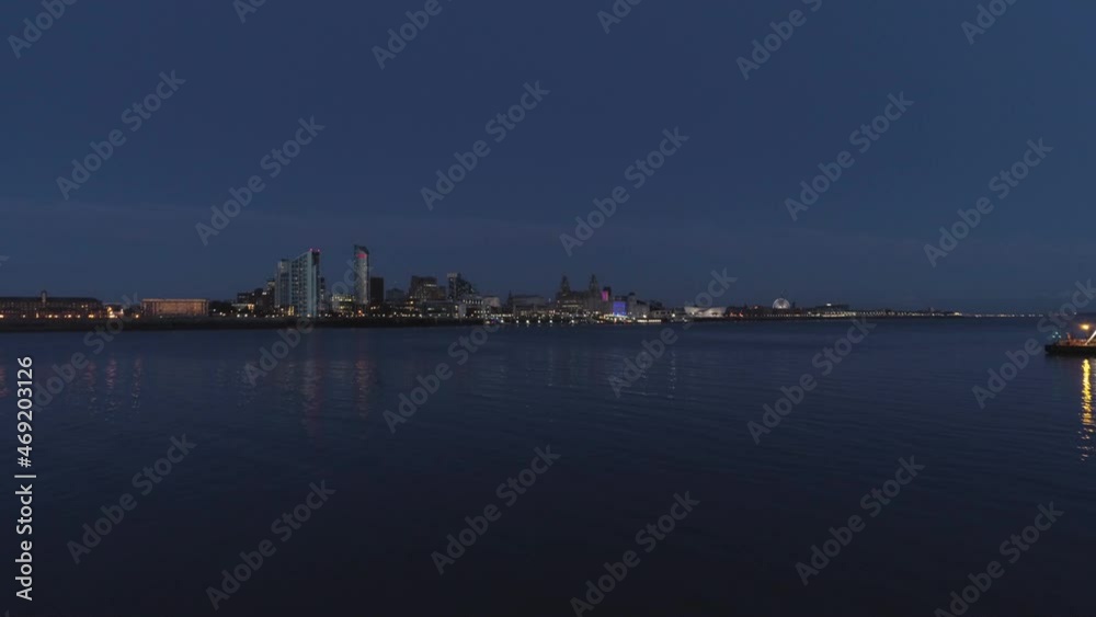River Mersey, River of Light, Liverpool, England. Night time. Drone flys forward. 4k River Mersey, River of Light, Liverpool, England. Night time. Drone flys forward. 4k