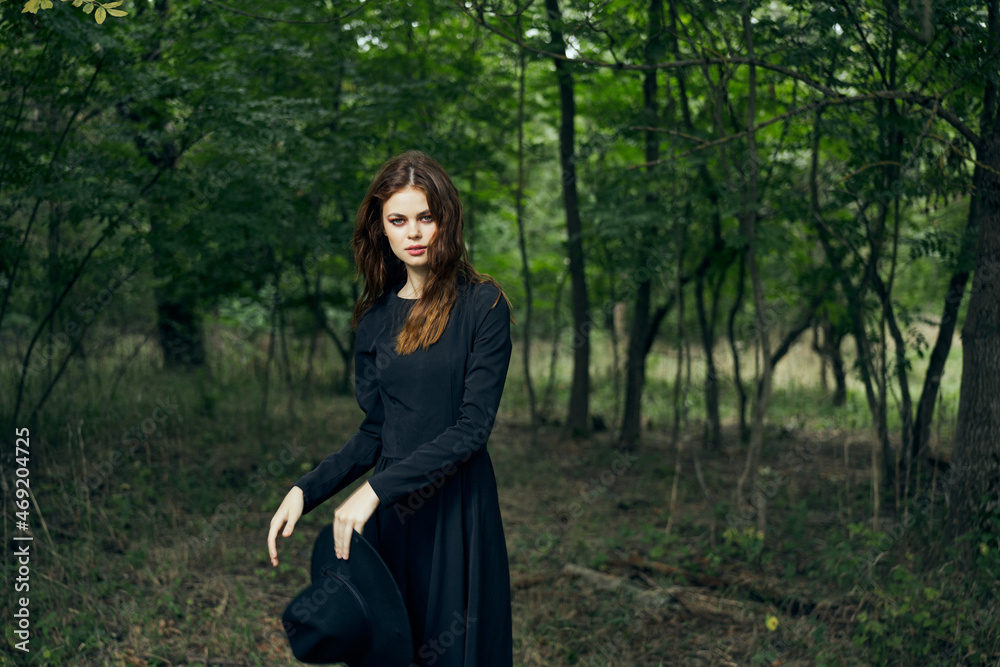 cheerful woman witch in the forest posing fantasy cheerful woman witch in the forest posing fantasy