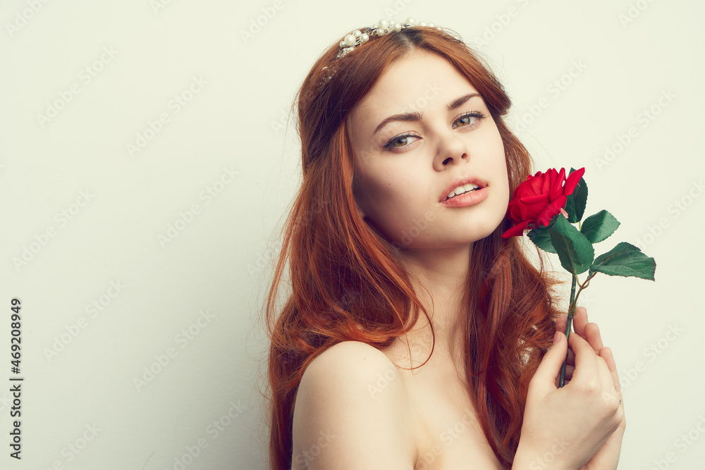 Fototapeta premium cheerful woman fashion hairstyle rose flower charm romance