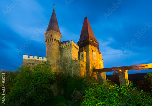 Medieval Corvin Castle in south of Transylvania in night lights, Hunedoara, Romania