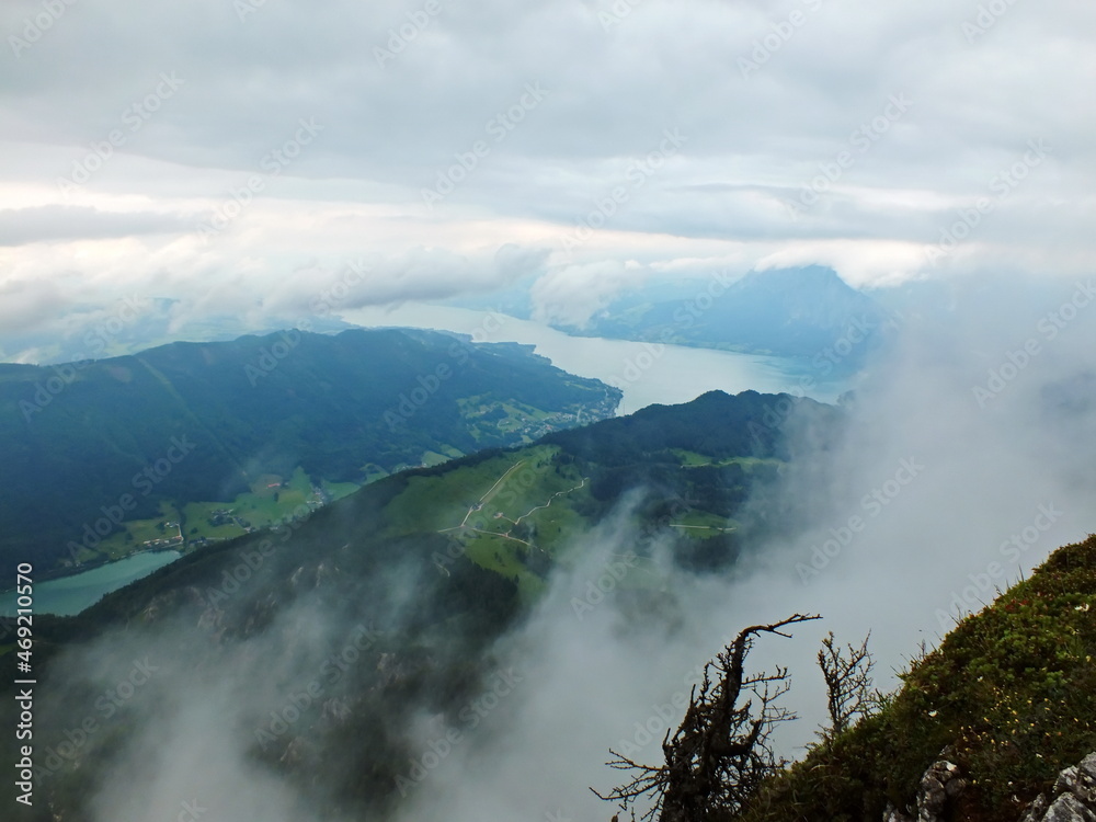 Top view on lake Wolfgangsee in Salzkammergut austria europe in rainy day on the shore covered mist
