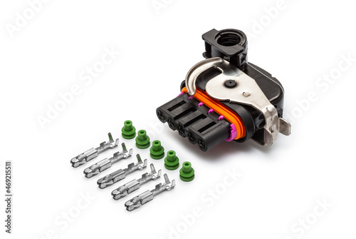 Obraz na płótnie Connector for wiring. Spare part of the engine electrical system. Contact electrical connector isolated on white background w salonie