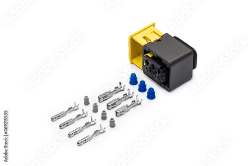 Obraz na płótnie Connector for wiring. Spare part of the engine electrical system. Contact electrical connector isolated on white background w salonie
