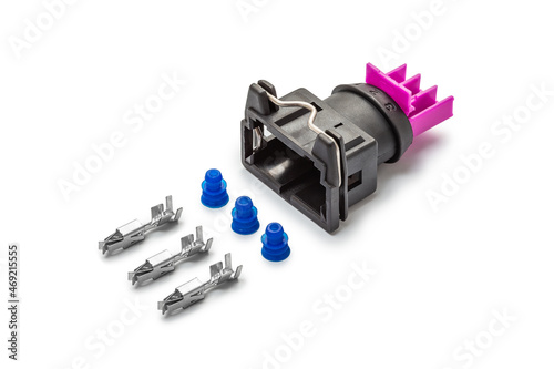 Obraz na płótnie Connector for wiring. Spare part of the engine electrical system. Contact electrical connector isolated on white background w salonie