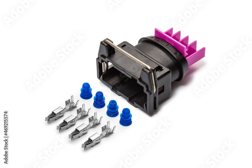 Obraz na płótnie Connector for wiring. Spare part of the engine electrical system. Contact electrical connector isolated on white background w salonie