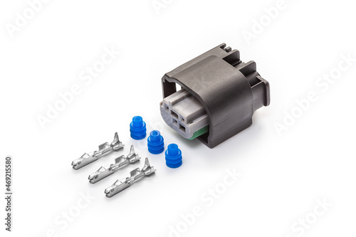 Obraz na płótnie Connector for wiring. Spare part of the engine electrical system. Contact electrical connector isolated on white background w salonie
