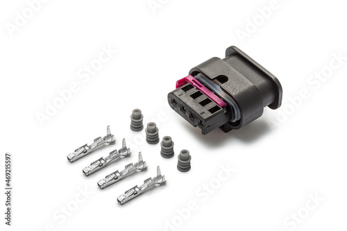 Obraz na płótnie Connector for wiring. Spare part of the engine electrical system. Contact electrical connector isolated on white background w salonie