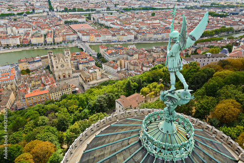 Statue of Saint Michel above Fourviere basilica, Lyon, France photo