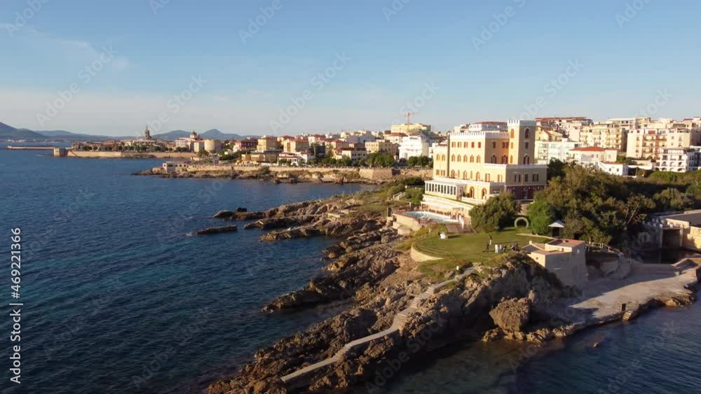 Incredible aerial shot over the city of Alghero in Italy. Cinematic landscape view Incredible aerial shot over the city of Alghero in Italy. Cinematic landscape view