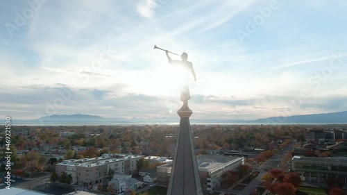 Angel Moroni Statue with Trumpet atop LDS Mormon Temple at Sunset in Provo, Utah - Aerial Orbit photo