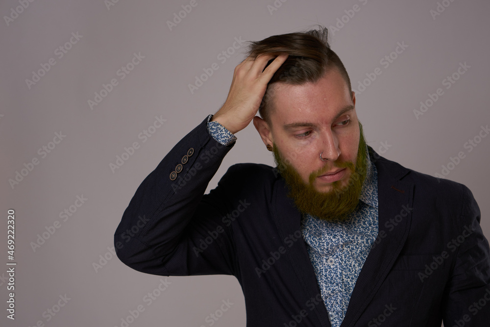 handsome bearded man in jacket fashion posing close-up handsome bearded man in jacket fashion posing close-up