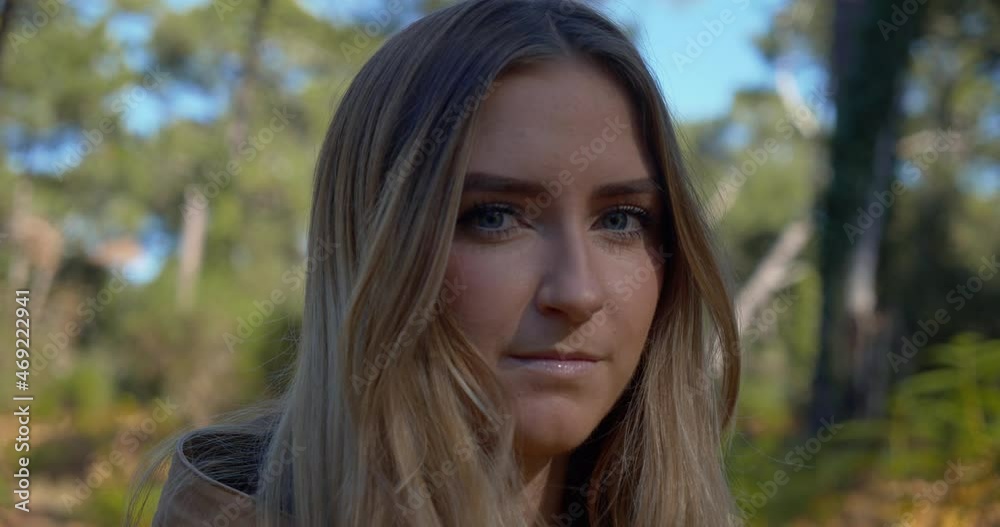 Close up portrait of confident and secure woman isolated looking at camera Close up portrait of confident and secure woman isolated looking at camera