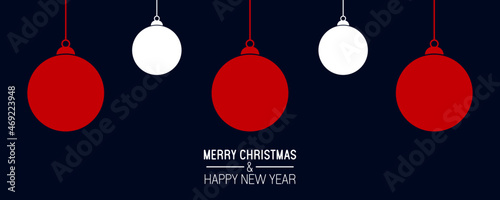 Christmas balls on black background. Merry Christmas and a Happy New Year concepr banner