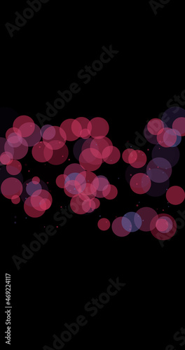 blurred pink particles on black background. blurred pink background